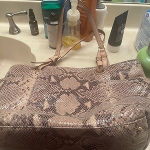 Snake skin Micheal kors purse great condition